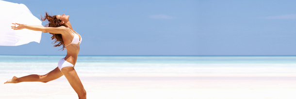 Woman Running on Beach